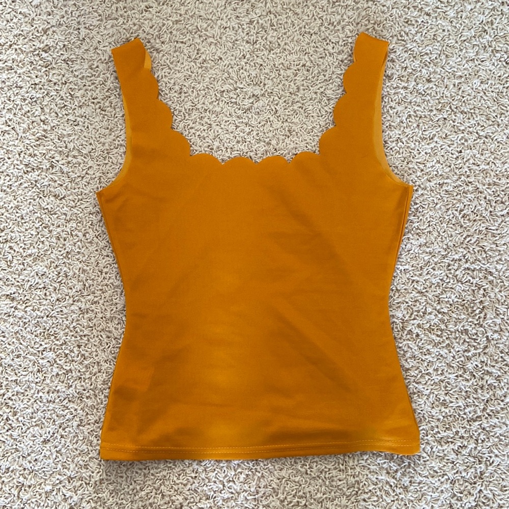 Scallop trimmed top.